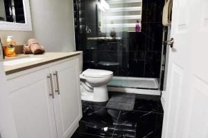Modern 4BR Lake Escape with Patio & BBQ Area