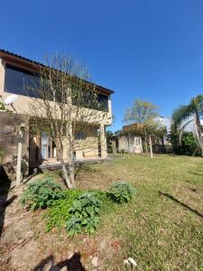 Casa Encanto da Lagoa com acesso à lagoa e pátio cercado