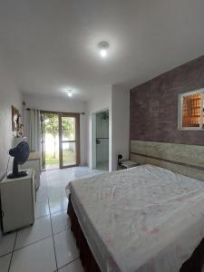 Casa Encanto da Lagoa com acesso à lagoa e pátio cercado