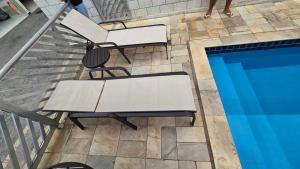 Casa 23 em Condomínio à 700m da Praia dos Astúrias Guarujá - SP