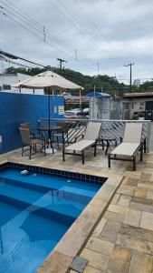 Casa 23 em Condomínio à 700m da Praia dos Astúrias Guarujá - SP