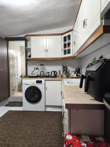 Το Σπίτι στην Πόλη του Μύλου των Ξωτικών