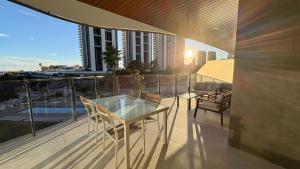 Sunset Waves I by Terreta Rentals