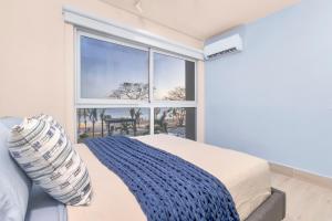 Surfside Beach Front Suites by Playa Caracol Resorts