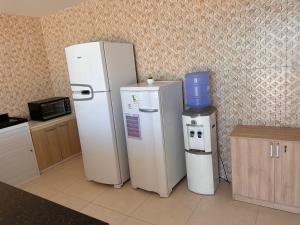 Suite2 com ar condicionado e a Beira mar , cozinha compartilhada e completa Micro ondas air fryer forno elétrico fogão Geladeira freezer gelagua e cafeteria elétrica Tudo para vc se sentir em casa além de um Deck com churrasqueira vista mar