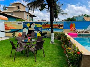 Recantos Pinheiros - Casa inteira, até 15 hóspedes - Piscina privativa, sinuca, ar condicionado e TVs nos 4 quartos - Condomínio Orla 500, lado praia - Unamar, Cabo Frio-RJ