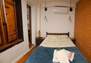 SCR-Glória- Charmosa Casa de Vila com 2 Quartos