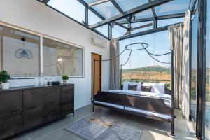 ELIVAAS White House 4-BHK Villa with Panoramic Hill Views, Glass Room, Outdoor Pool & Dam nearby