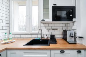 Dąbrowskiego Modern Apartment by BookingHost