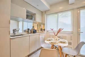 Apartment Le Marais Place des Vosges by Studio prestige