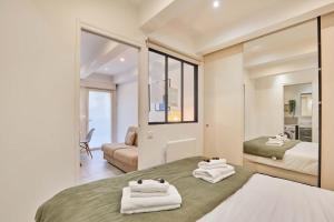 Apartment Le Marais Place des Vosges by Studio prestige