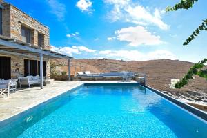 Waterfront villa "Afros" with a pool, direct access to the sea and a small beach