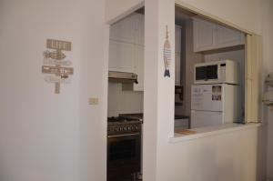 FANTASTIC SARDINIA VILLETTE CON GIARDINO Fronte Mare Fertilia FAHO-GAV01-GAV02