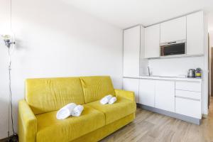 Hostdomus - Yellow Suite