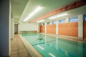 Design and Wellness apartment with Pool and GYM