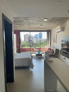 Apto zona shopping del sol ,monoambiente completo muy grande y luminoso,con garage