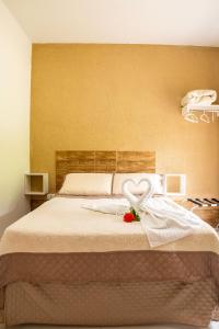 Pousada Cantinho do Sossego Paraty tem Piscina com Vista pra Montanha, Salão de Jogos, Café da Manhã, Estacionamento, Gerador de Energia, Próximo as principais Praias, Ilhas e Cachoeiras