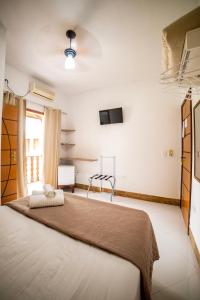 Pousada Cantinho do Sossego Paraty tem Piscina com Vista pra Montanha, Salão de Jogos, Café da Manhã, Estacionamento, Gerador de Energia, Próximo as principais Praias, Ilhas e Cachoeiras