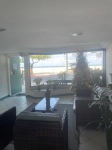 Apê de fundos em condo beira mar com garagem e Wi-Fi