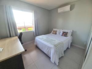 Casa no segundo andar na Praia da Cal com ar e sacada
