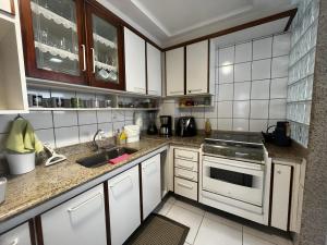 ESathler ar garagem pertinho da praia