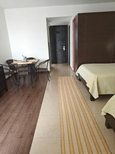 Nice and comfy studio appartment at Playa Blanca Beach Resort Trown Center