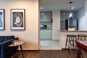 Bright 3BR Apartment with Balcony and Workspace