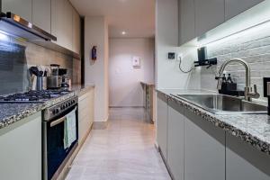 Bright 3BR Apartment with Balcony and Workspace