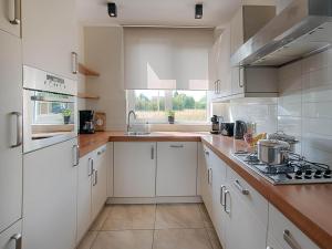 Villa on a beautiful resort with sauna and view