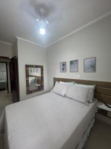 2 dormitórios com ar-condicionado, Wi-Fi e churrasqueira