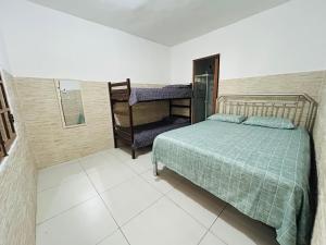 Casa em Bertioga com piscina aquecida Sitio família ROCHA