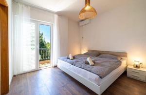 Seaside holiday house Barbat, Rab - 25029