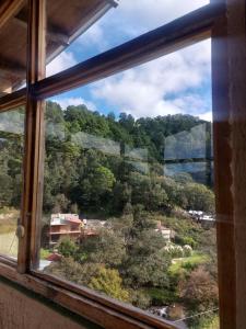 Suite encantadora con vista al Rio