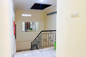 Taisir Residence Near Palmerah Mitra RedDoorz