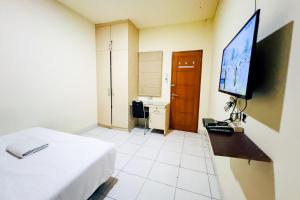 Taisir Residence Near Palmerah Mitra RedDoorz