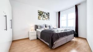 Ferienwohnung in der Stadt mit kostenfreier Tiefgarage bis 1,50m Fahrzeughöhe - 2 Doppelbetten, Küche, Bad