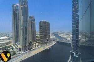 Vogue Vacation Homes, Business Bay Court Tower close to Downtown Burj Khalifa and Dubai Mall, Studio Apartment with Canal view