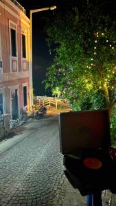 House with Blue Balcony