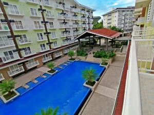 Amani Grand Resort Residences Nearest to Airport with FREE POOL & GYM ACCESS