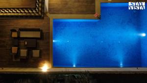 StayVista at Villa Deluna with Pool & BBQ