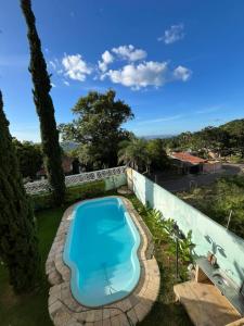 Chácara com piscina e 3 varandas no Caldas