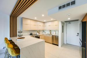 Walk to Beach Luxe Harbor-View Condo in Naples!