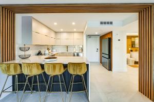 Walk to Beach Luxe Harbor-View Condo in Naples!