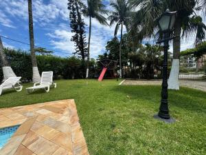 Cobertura Duplex frente Praia Massaguaçu 6 pessoas com vista e piscina