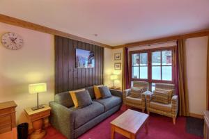 ARC 1950 - Appartement 6 personnes - Départ ski aux pieds - Sauna, Hammam, Jacuzzi, Piscine chauffée