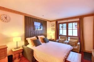 ARC 1950 - Appartement 6 personnes - Départ ski aux pieds - Sauna, Hammam, Jacuzzi, Piscine chauffée