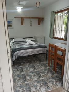 Aconxeguinho espaço secundário privativo c banheiro compartilhado