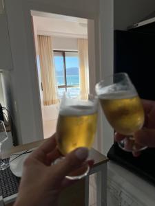 Apartamento pé na areia com vista para o mar