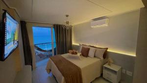 apartamento beira mar