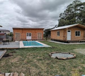 Postal del Valle cabañas Tandil